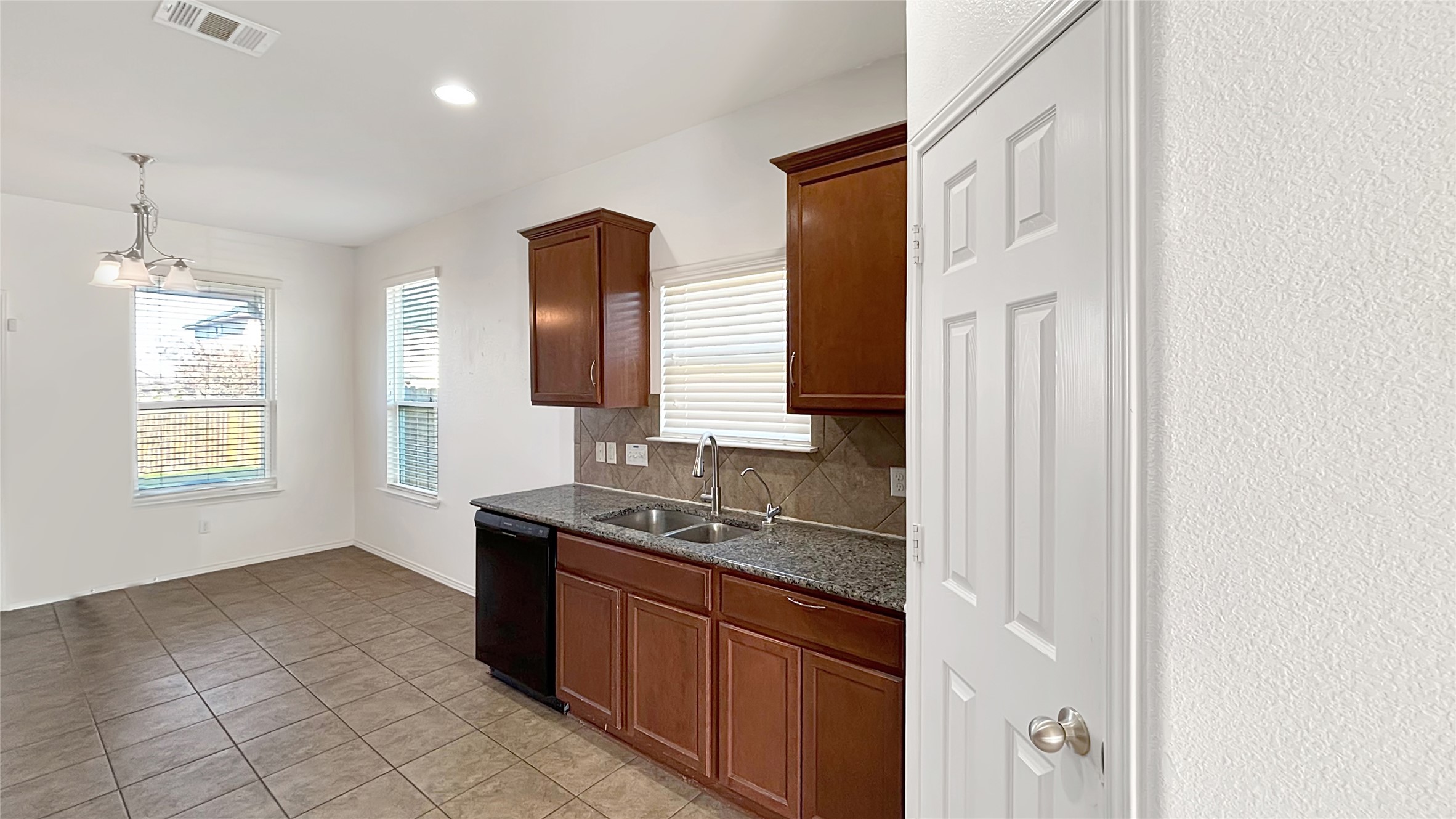 133 Langtry Lane Jarrell, TX 76537 - Photo 21 of 28 View of kitchen from pantry and dining room.