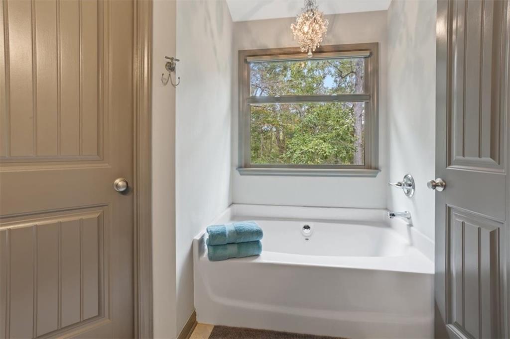 253 Zenith Trail Ellijay, GA 30540 - Photo 15 of 34 a bath tub sitting next to a window