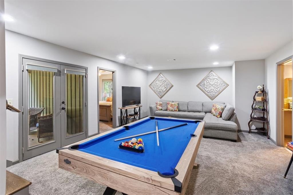 253 Zenith Trail Ellijay, GA 30540 - Photo 20 of 34 a room with furniture and a flat screen tv