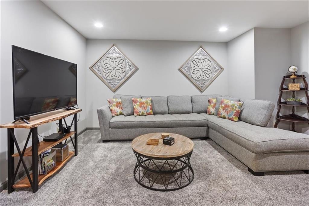253 Zenith Trail Ellijay, GA 30540 - Photo 21 of 34 a living room with furniture and a flat screen tv