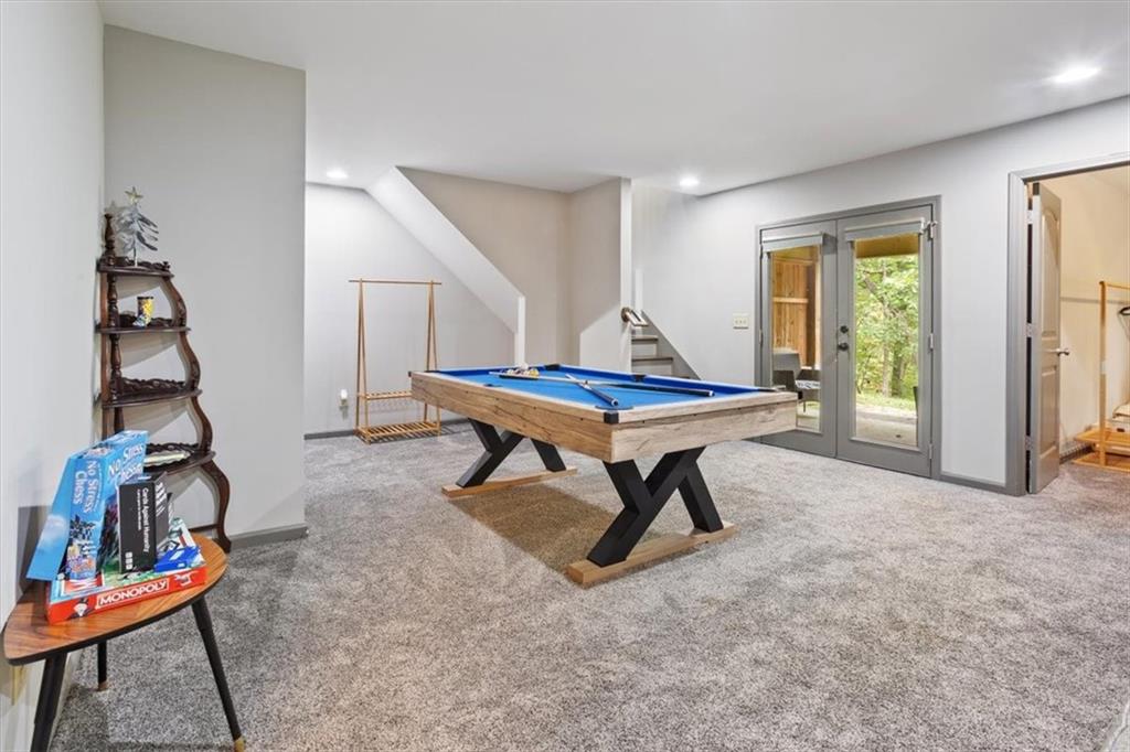 253 Zenith Trail Ellijay, GA 30540 - Photo 24 of 34 a room with furniture and air hockey table