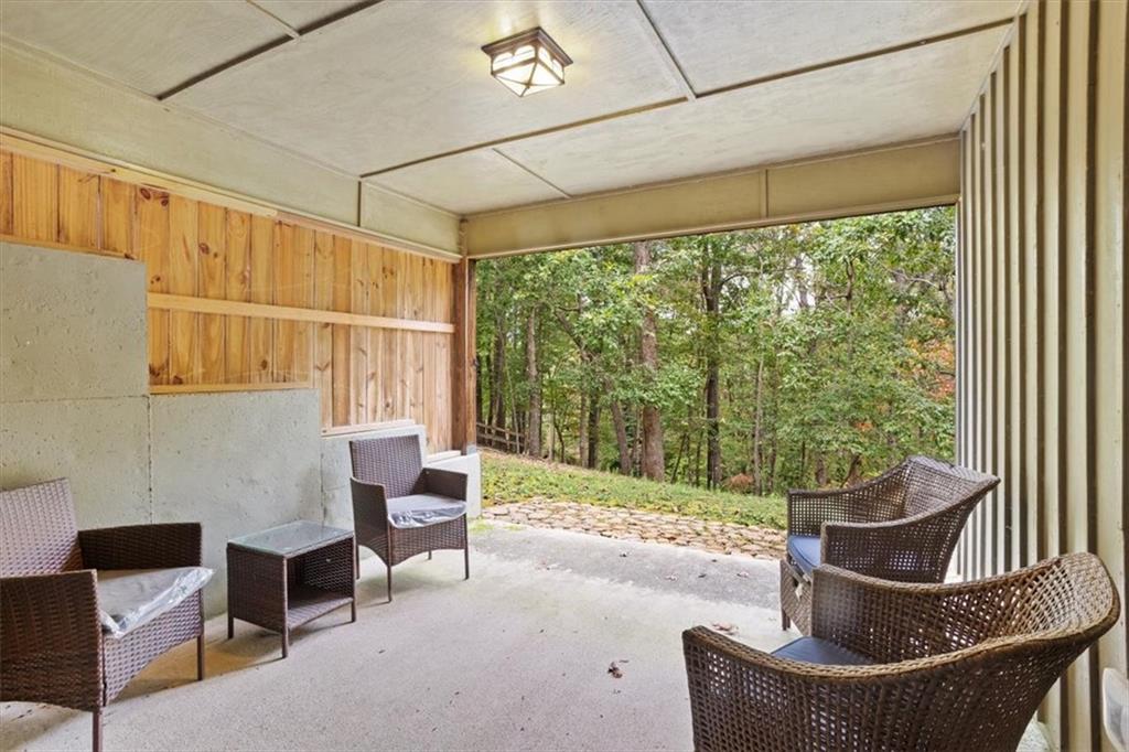 253 Zenith Trail Ellijay, GA 30540 - Photo 25 of 34 a living room with furniture and a window