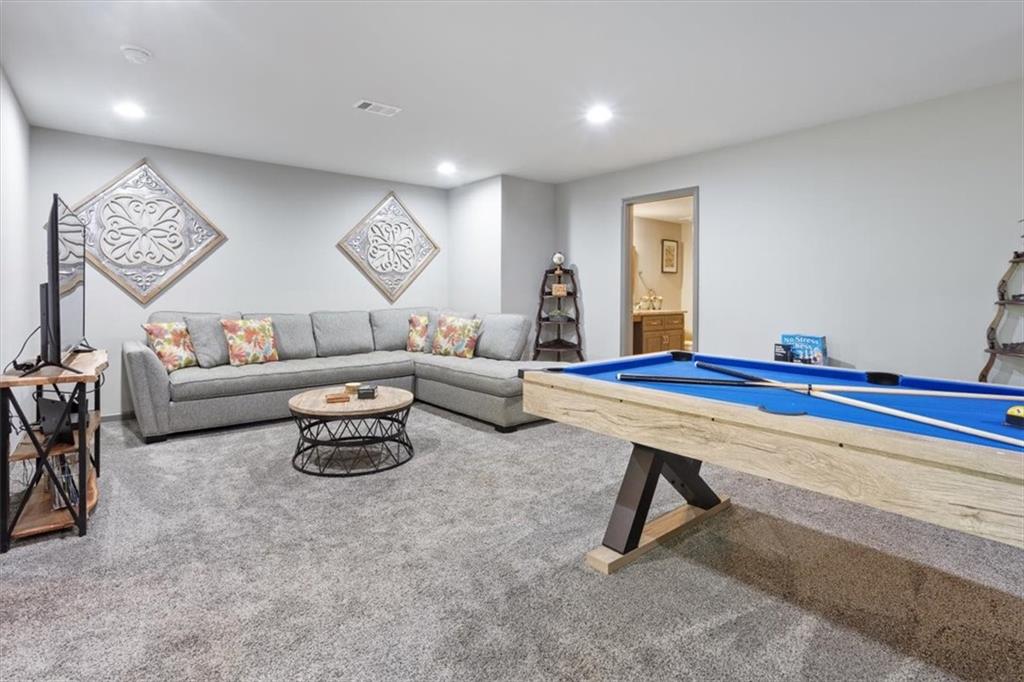 253 Zenith Trail Ellijay, GA 30540 - Photo 3 of 34 a living room with furniture a rug and a window