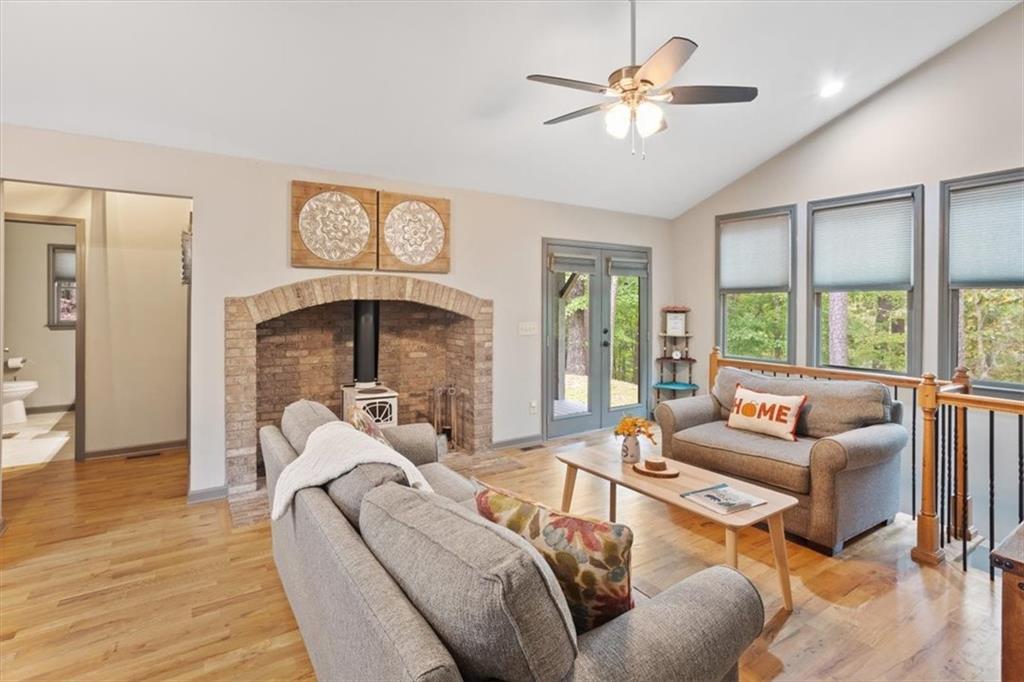 253 Zenith Trail Ellijay, GA 30540 - Photo 6 of 34 a living room with furniture and a chandelier