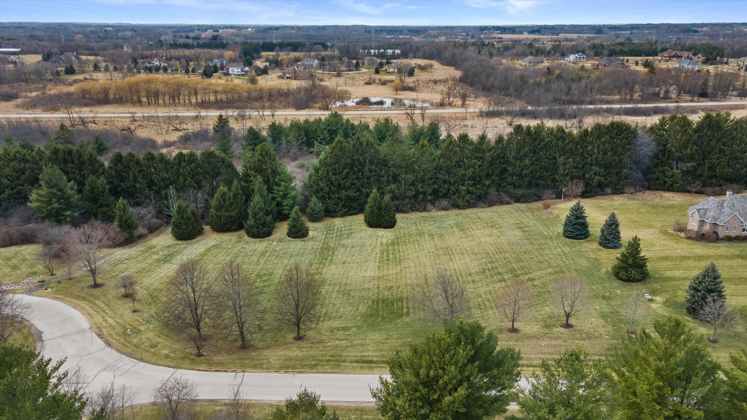 13965 North Pine Bluff Road Mequon, WI 53097 - Photo 2 of 14 Mature trees onsite