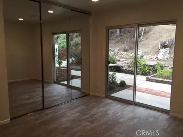 a view of an empty room and window