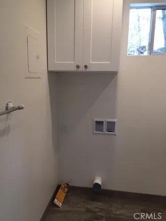 a view of cabinets and window