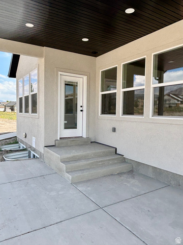 1184 West 3250 North Ogden, UT 84414 - Photo 8 of 69 Covered patio featuring a dark ceiling with recessed lighting