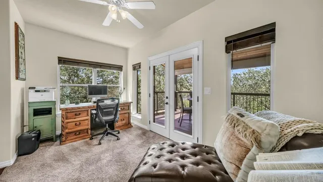 a bedroom with furniture and a window