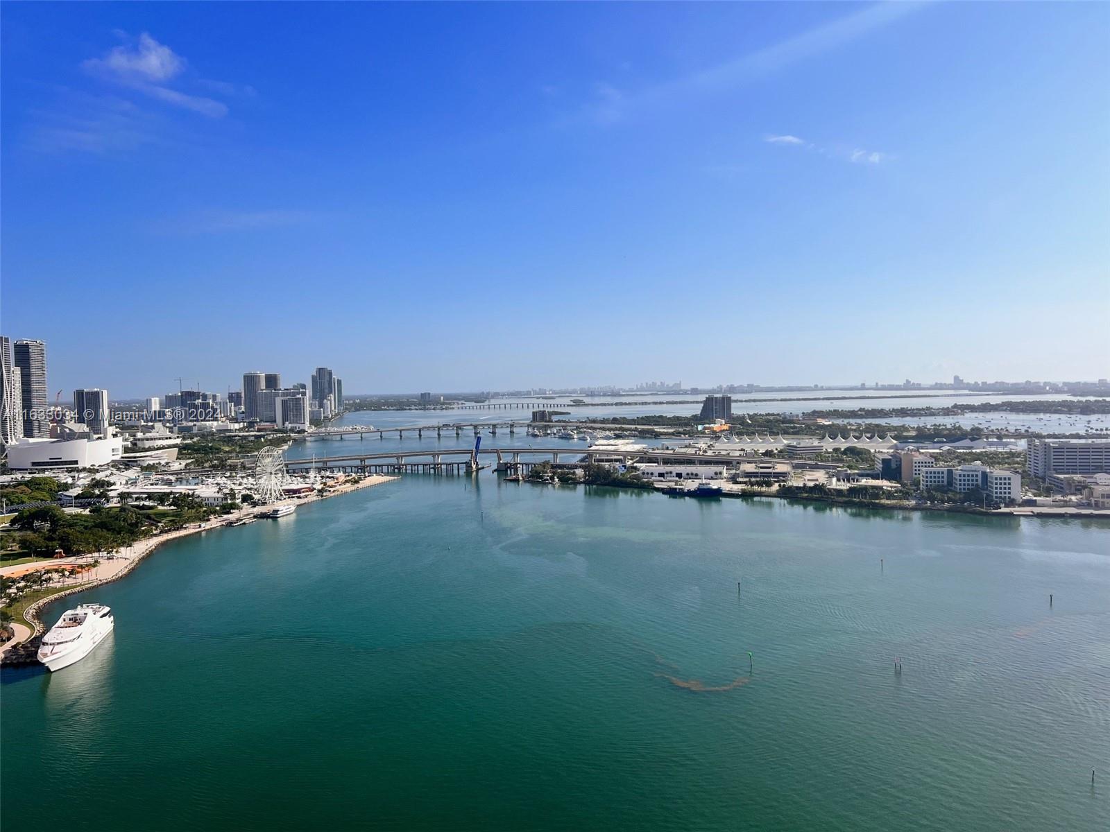 848 Brickell Key Drive, Unit 3701 Miami, FL 33131 - Photo 1 of 84 a view of a city and lake