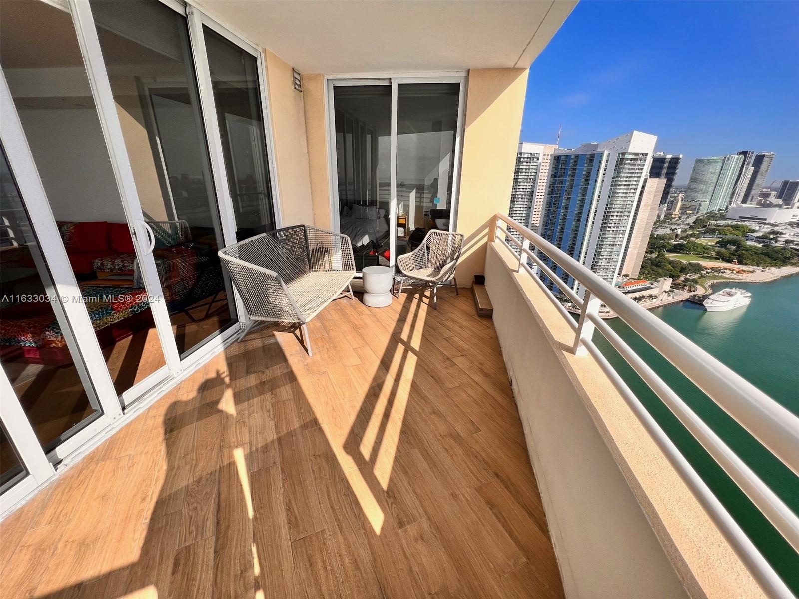 848 Brickell Key Drive, Unit 3701 Miami, FL 33131 - Photo 11 of 84 a view of a living room with furniture