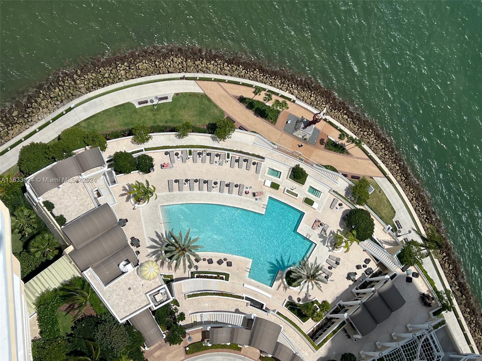 848 Brickell Key Drive, Unit 3701 Miami, FL 33131 - Photo 69 of 84 an aerial view of a house with a yard