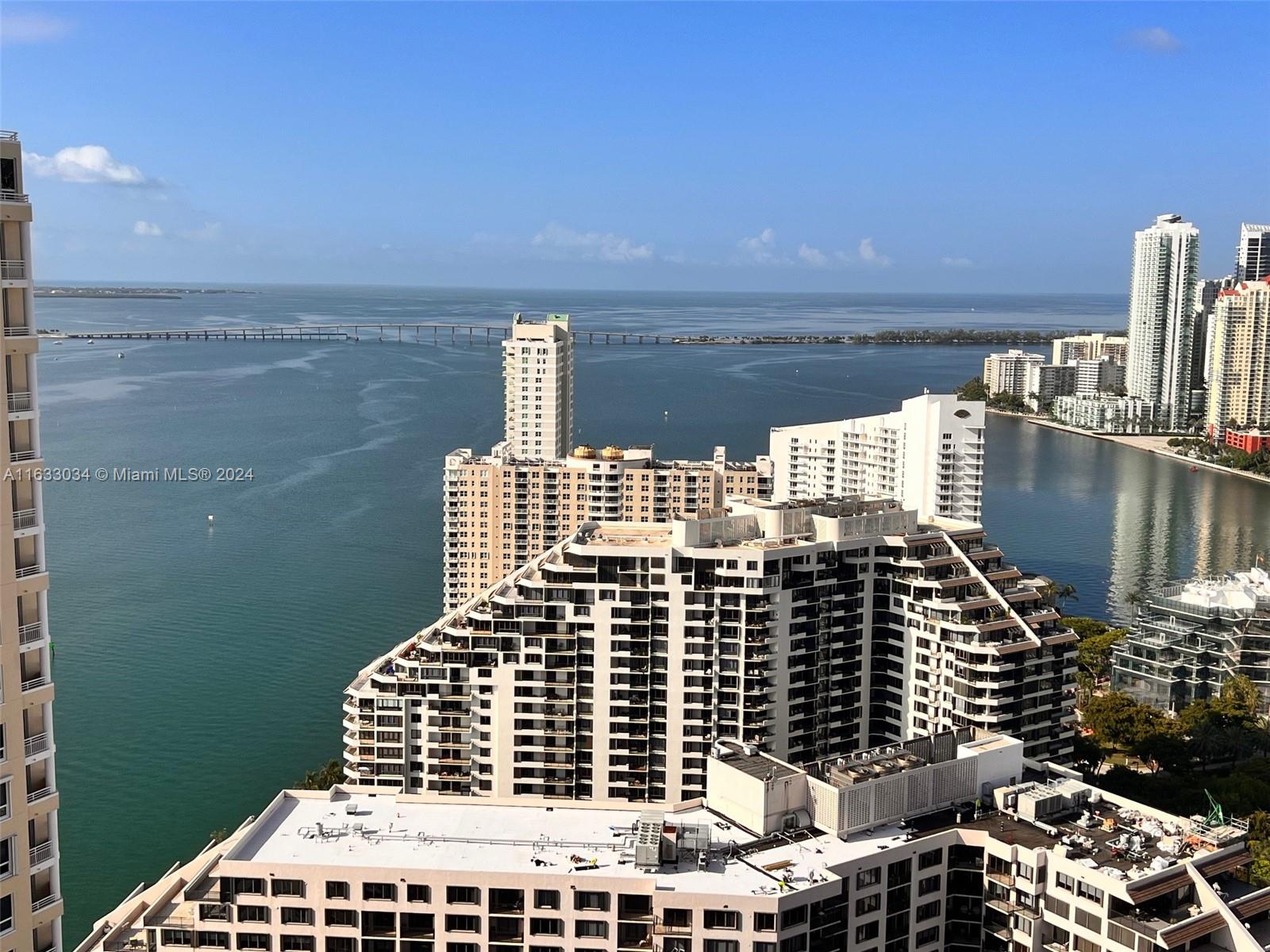 848 Brickell Key Drive, Unit 3701 Miami, FL 33131 - Photo 9 of 84 a view of a balcony with two chairs