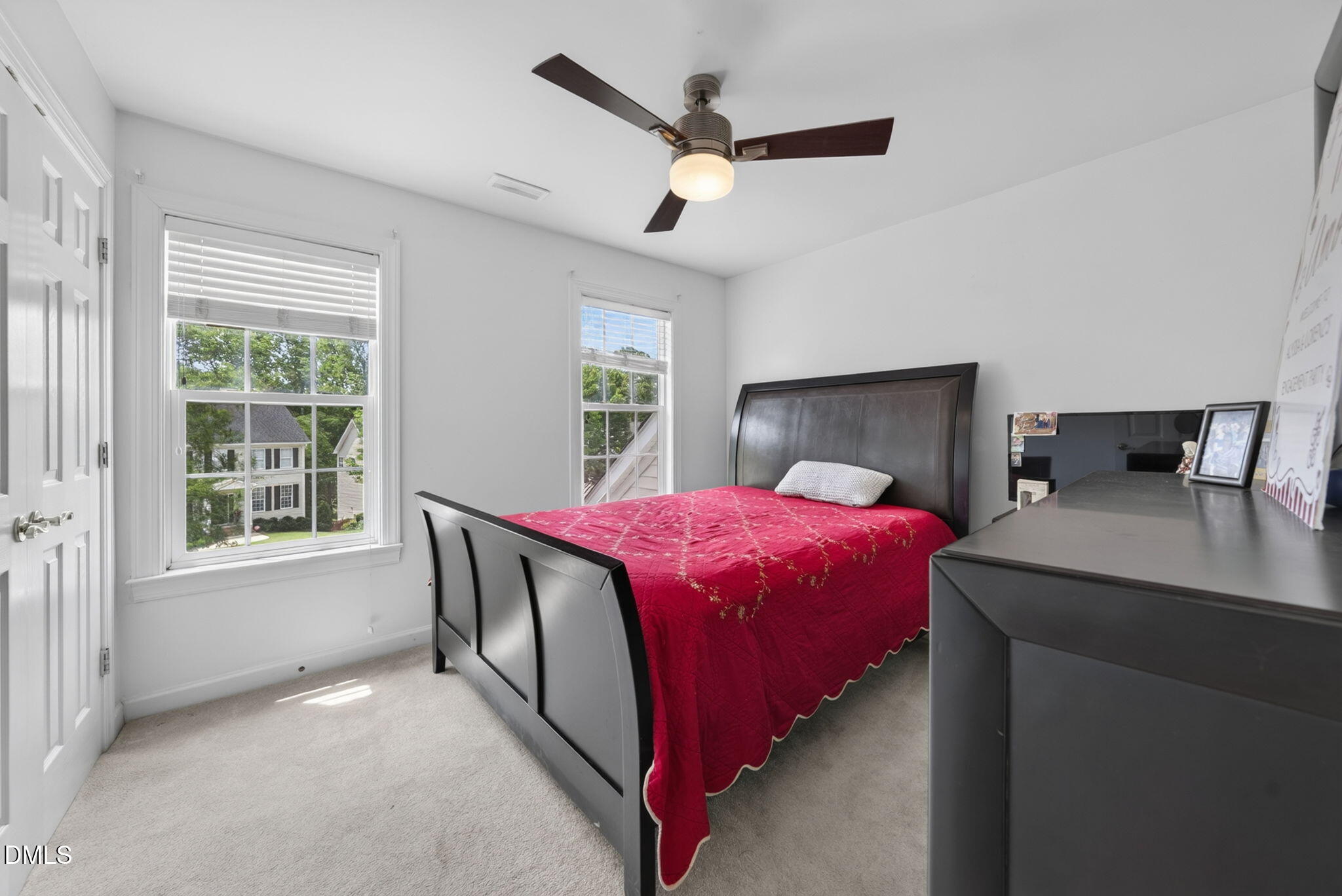 1258 Horsham Way Apex, NC 27502 - Photo 19 of 32 a spacious bedroom with a bed and window