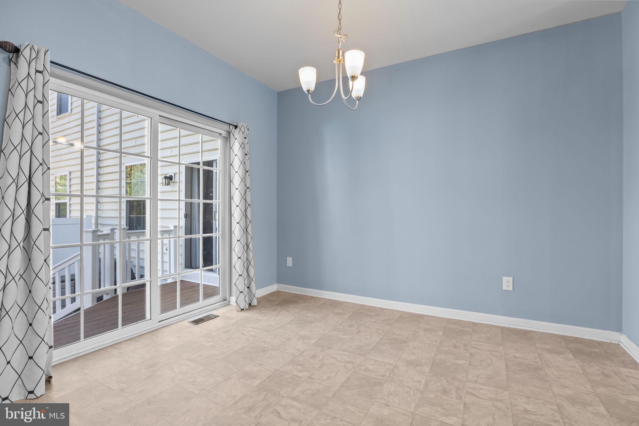 3753 Jacob Stout Road, Unit 3 Doylestown, PA 18902 - Photo 14 of 34 wooden floor in an empty room with a window