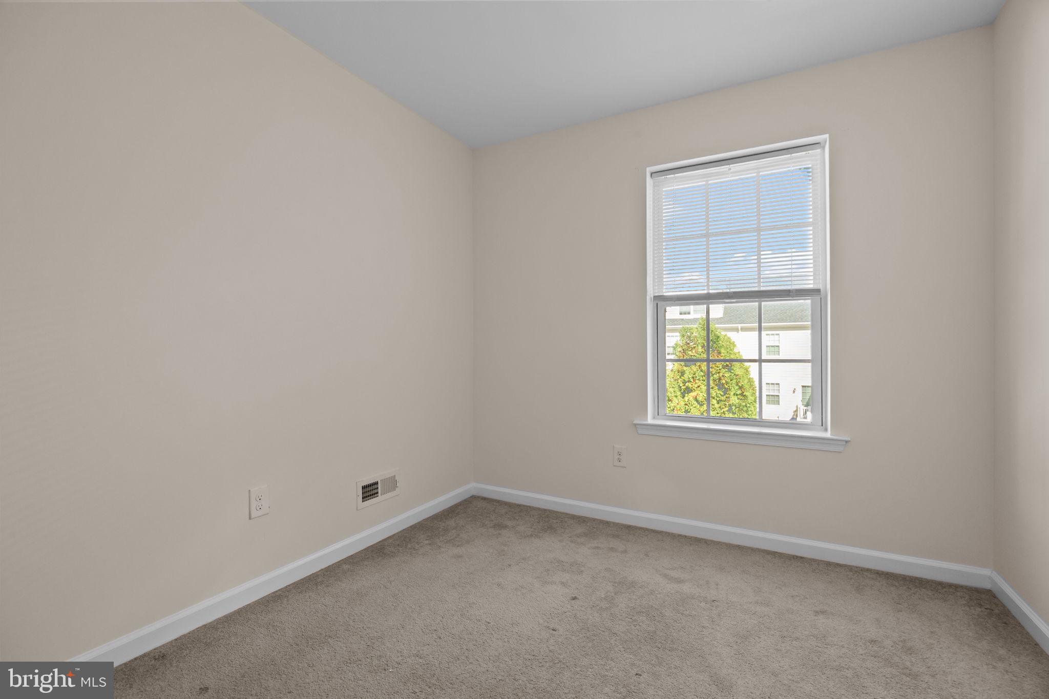 3753 Jacob Stout Road, Unit 3 Doylestown, PA 18902 - Photo 15 of 34 an empty room with a window