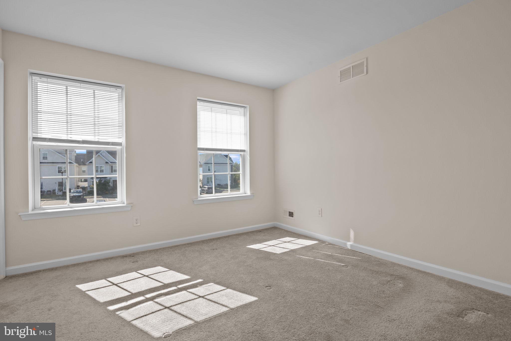 3753 Jacob Stout Road, Unit 3 Doylestown, PA 18902 - Photo 18 of 34 an empty room with windows