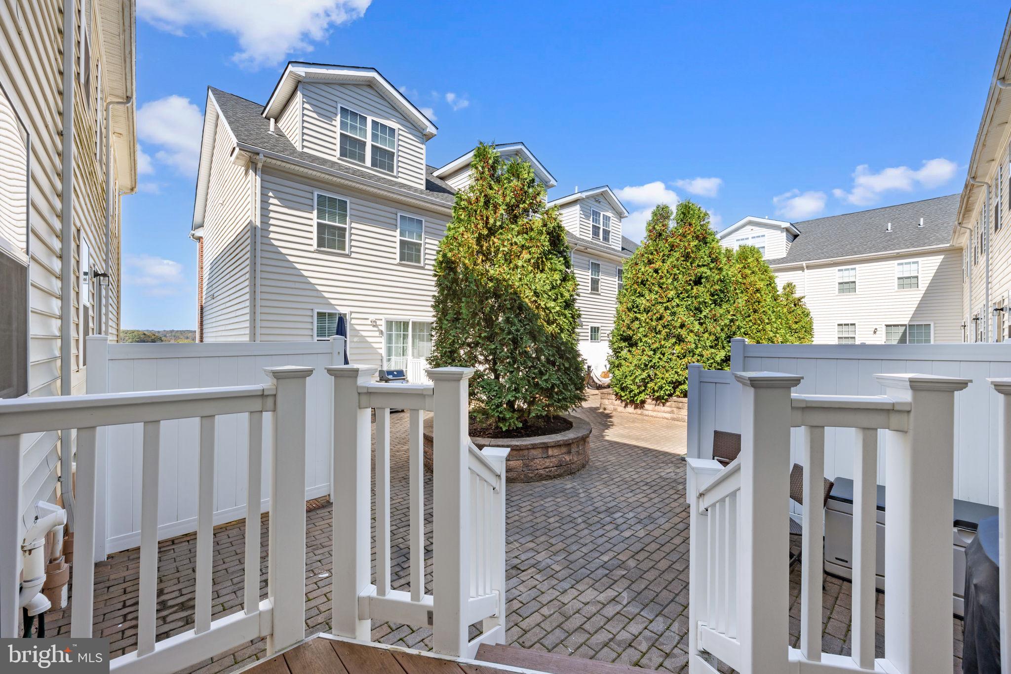 3753 Jacob Stout Road, Unit 3 Doylestown, PA 18902 - Photo 30 of 34 a front view of a house with a yard