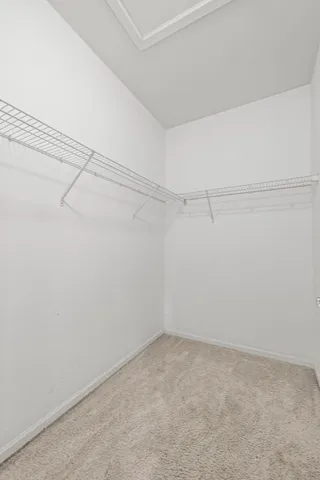 a view of a room with racks on the wall