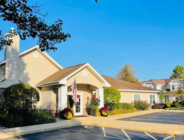 a room with gym equipment and windows
