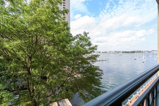 a view of a lake from a balcony
