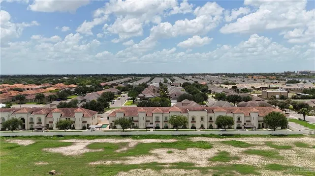 an aerial view of residential building with outdoor space