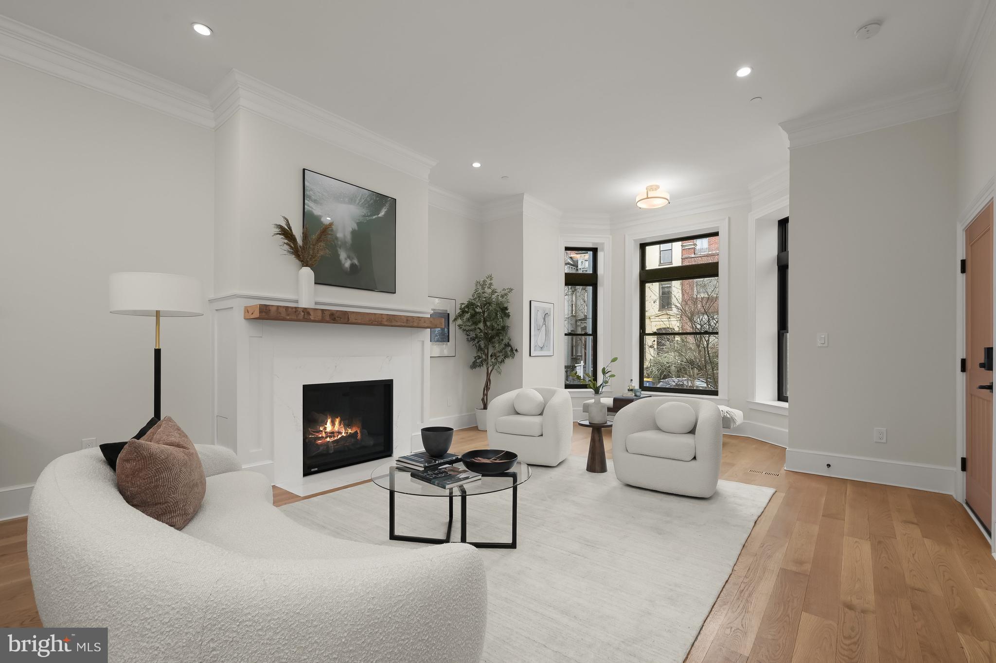 Living Room with Gas Fireplace and Bay Window