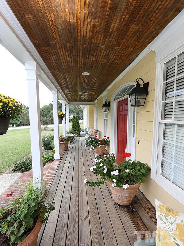 9009 New Century Road Wake Forest, NC 27587 - Photo 2 of 17 Fantastic front porch welcomes you to this terrific home!