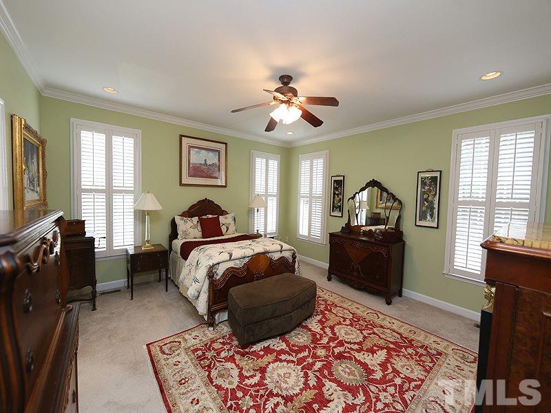 9009 New Century Road Wake Forest, NC 27587 - Photo 8 of 17 This large master bedroom has terrific windows, walk in closet and plenty of room for your furniture!