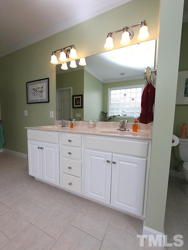 9009 New Century Road Wake Forest, NC 27587 - Photo 9 of 17 Dual Vanity Master Bath with good storage.