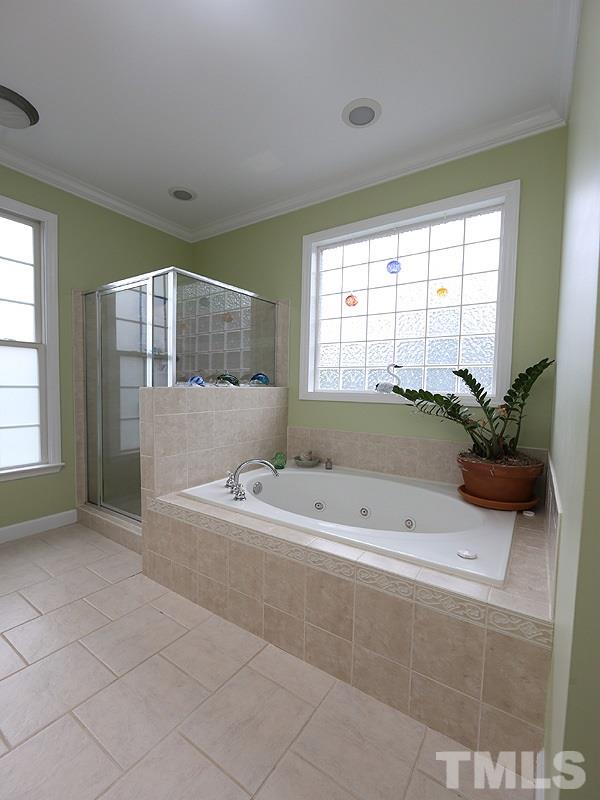 9009 New Century Road Wake Forest, NC 27587 - Photo 10 of 17 Tiled floor, Garden Tub and Separate Shower