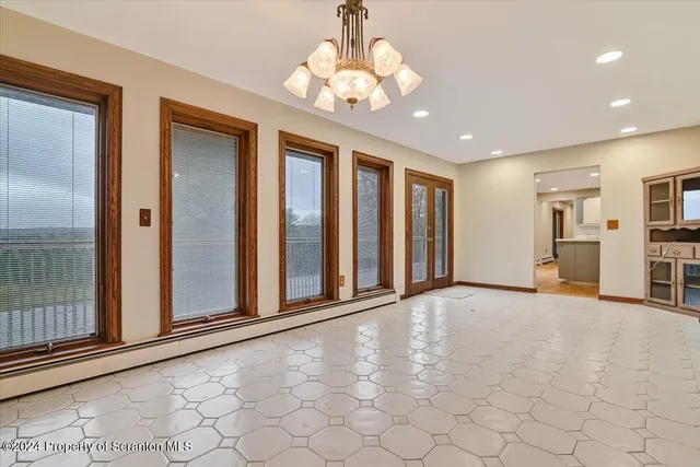 a view of an empty room with window