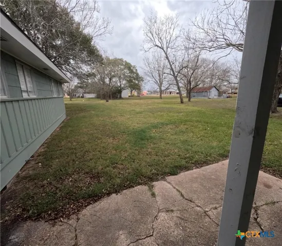 a house view with a outdoor space