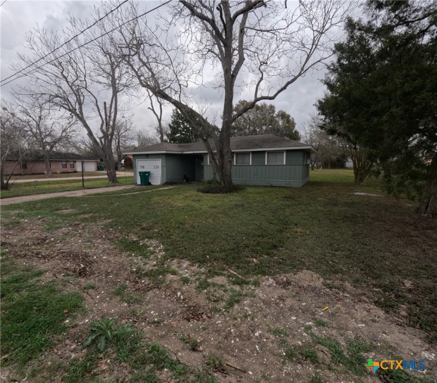 218 North 4th Ganado, TX 77962 - Photo 2 of 19 a view of a house with a yard