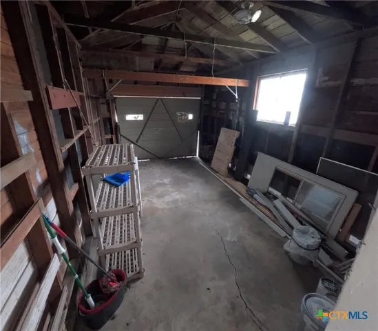 a view of gym equipment in a room