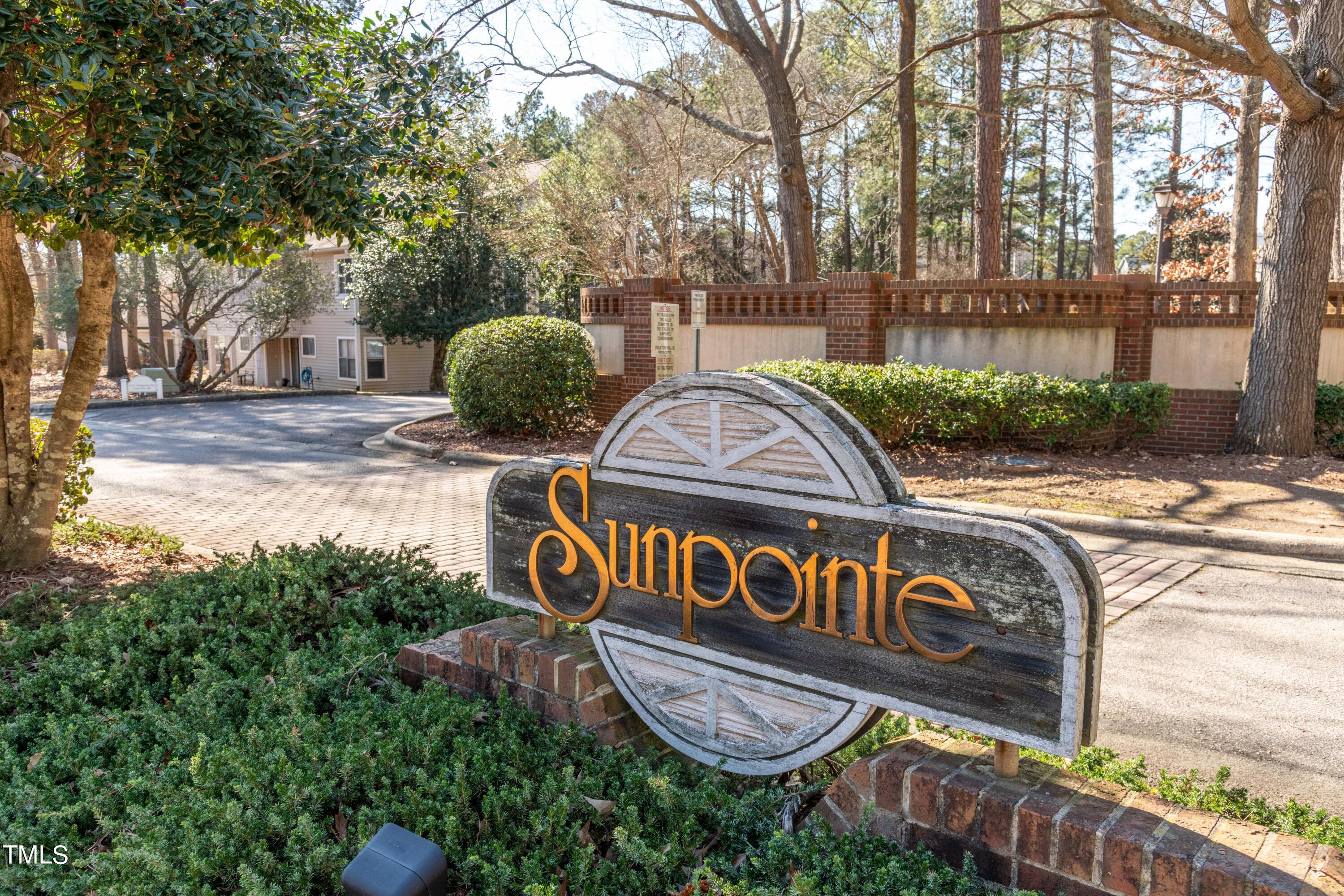 6121 Sunpointe Drive, Unit 102 Raleigh, NC 27606 - Photo 1 of 30 Sunpointe Sign