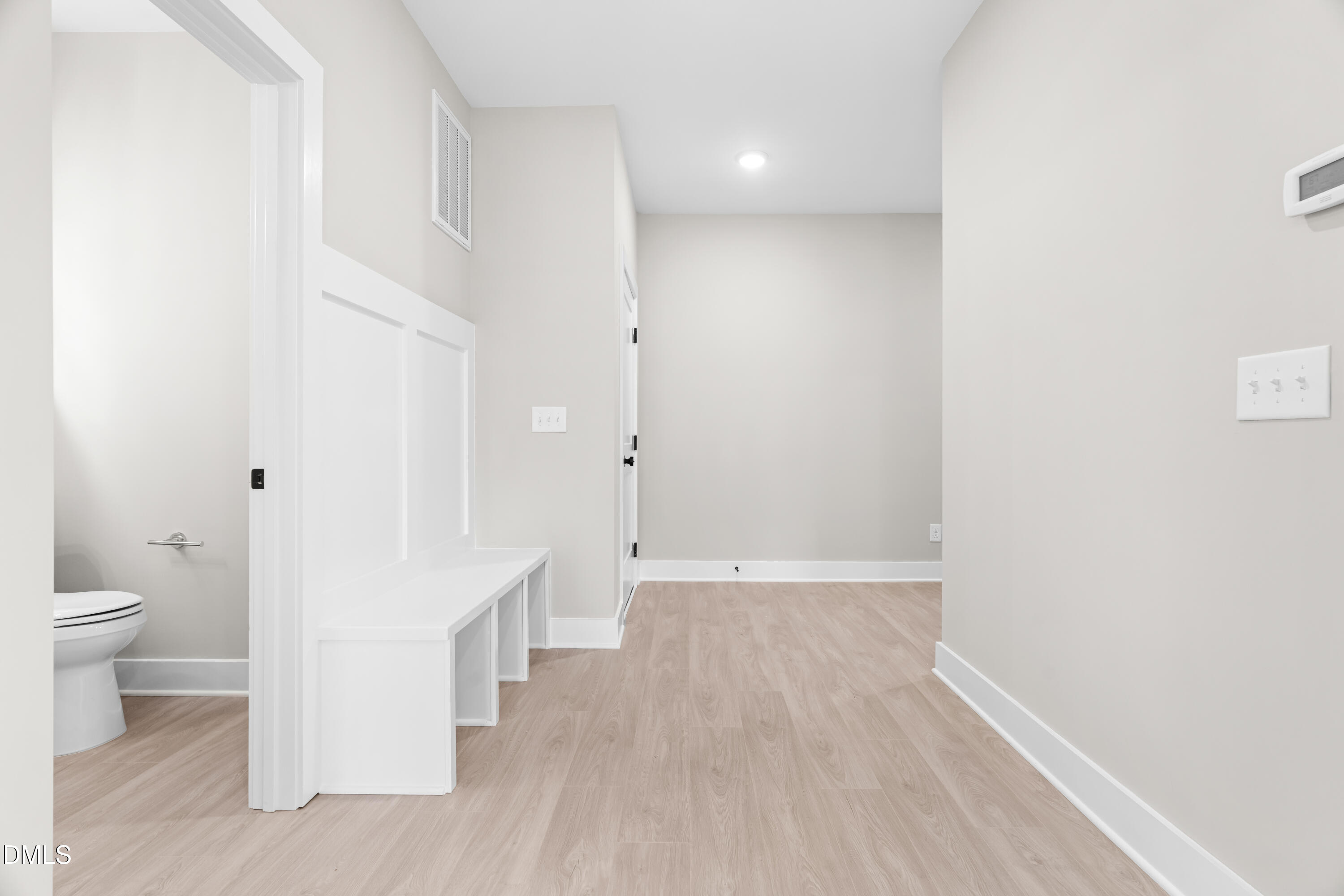 1016 Harper Road Raleigh, NC 27603 - Photo 15 of 46 a view of a bathroom with wooden floor