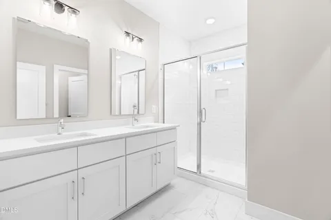 a view of a bathroom with wooden floor