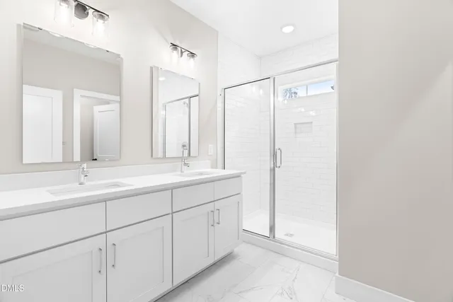 a view of a bathroom with wooden floor