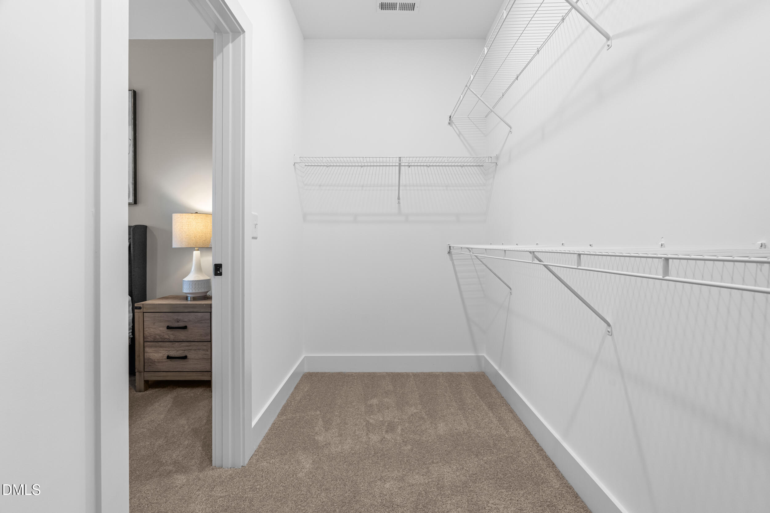 1016 Harper Road Raleigh, NC 27603 - Photo 22 of 60 a view of walk in closet