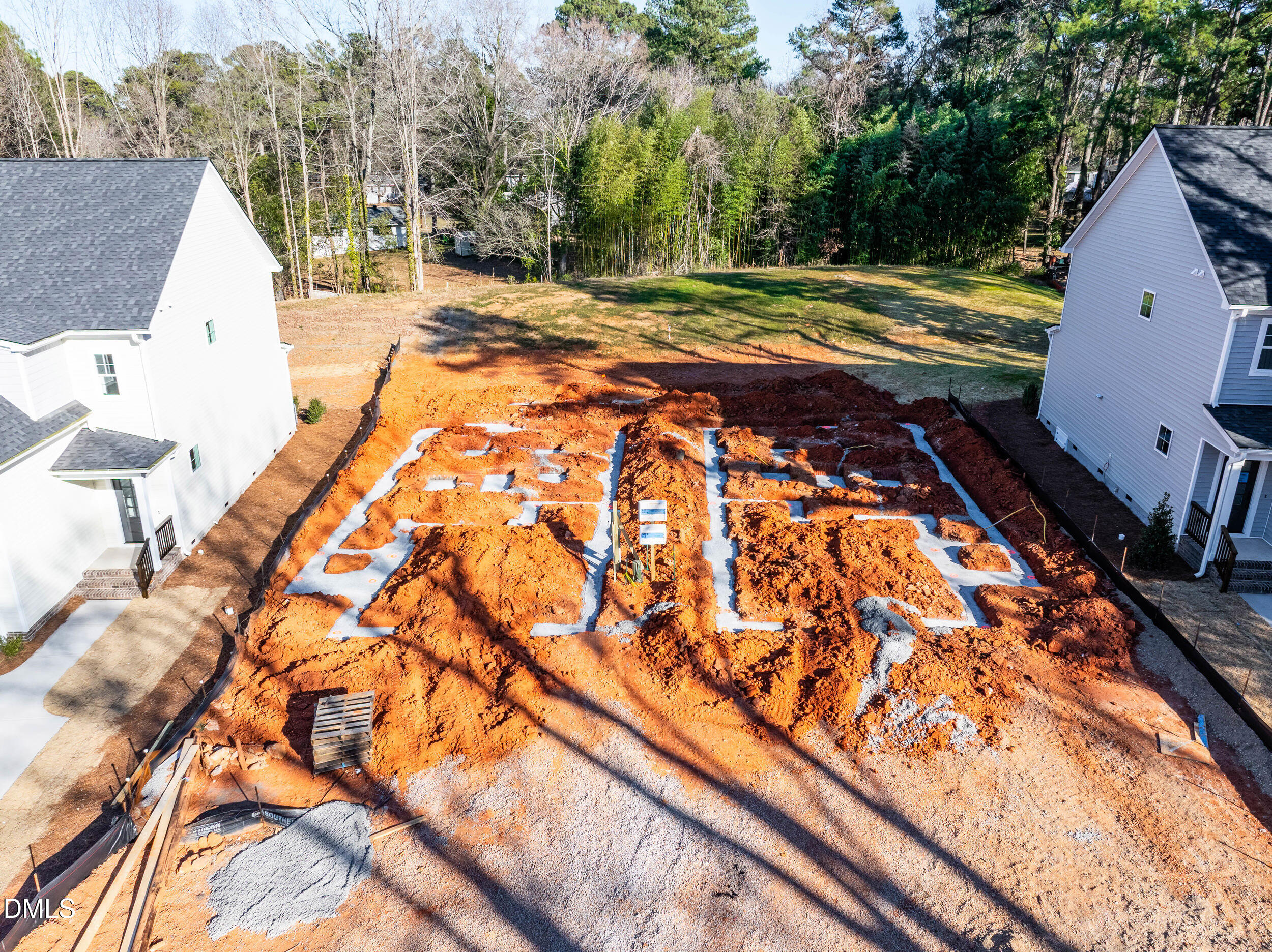 1016 Harper Road Raleigh, NC 27603 - Photo 32 of 60 a view of swimming pool with a yard