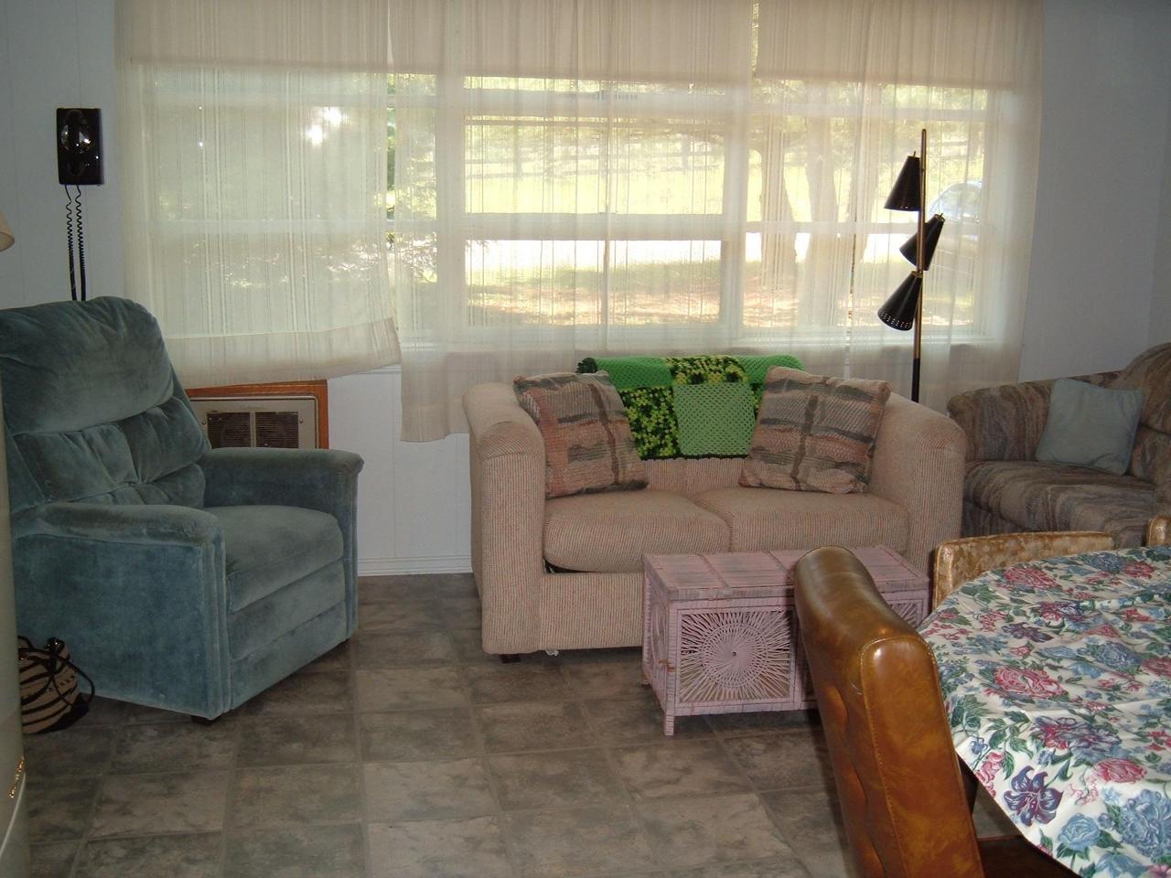 488 Robin Hood Road Kunkletown, PA 18058 - Photo 4 of 6 a living room with furniture and a large window