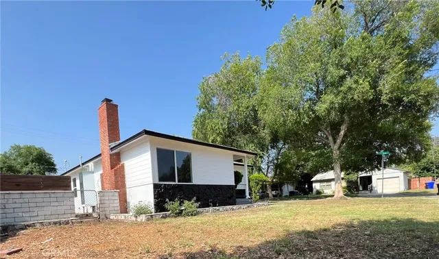 a view of a house with a patio