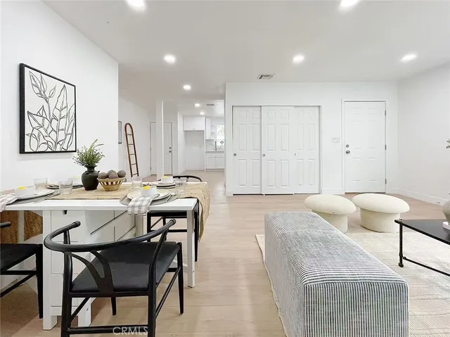 a living room with furniture and a table