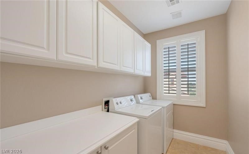 3 Tall Ruff Drive Las Vegas, NV 89148 - Photo 39 of 54 Ample storage and modern appliances define this well-appointed utility space.