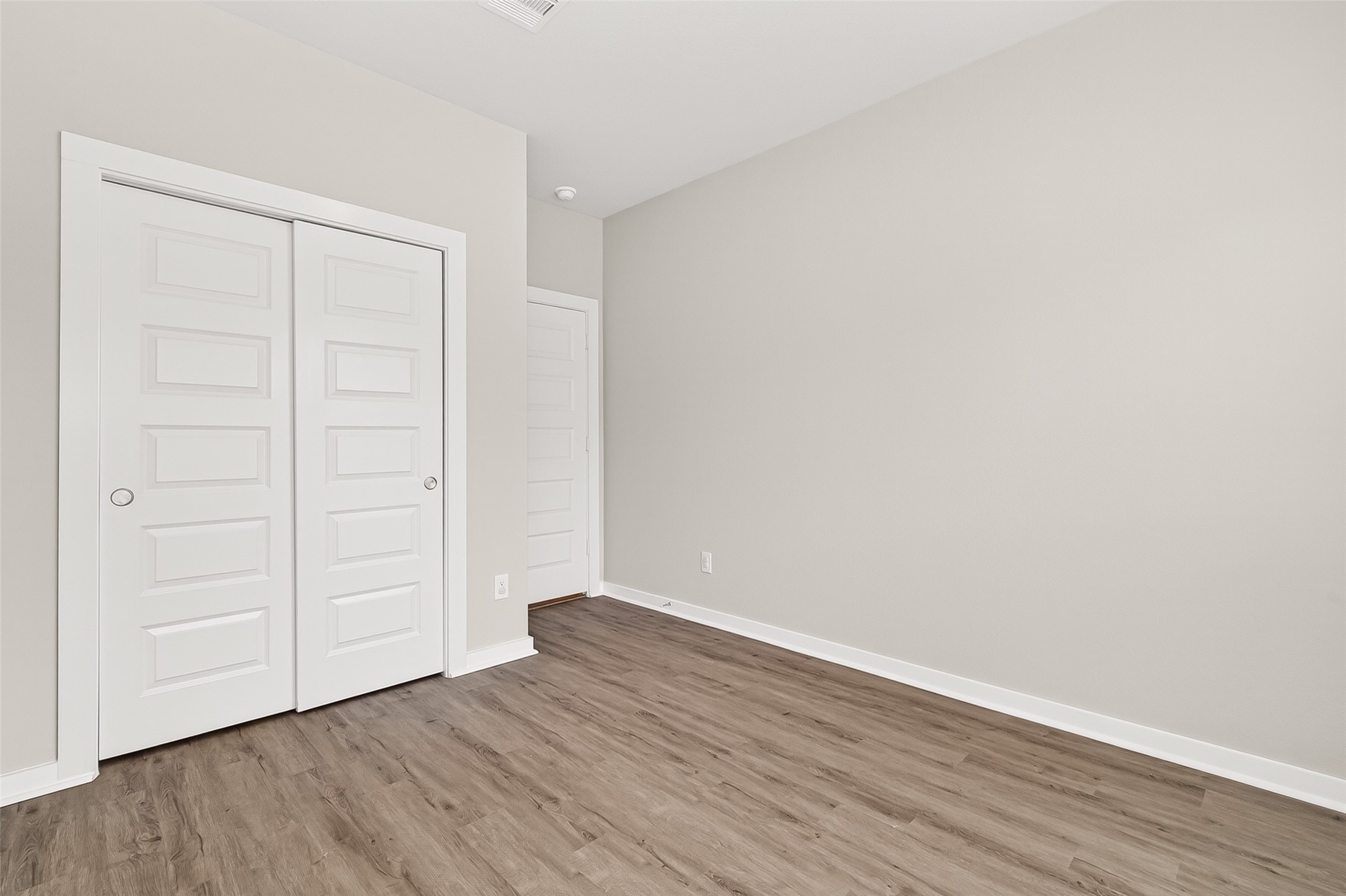 2142 Reed Cave Lane Spring, TX 77386 - Photo 6 of 50 a view of an empty room with wooden floor