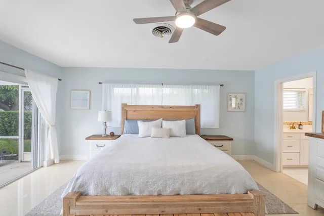 a room with lots of wooden furniture and a wooden table