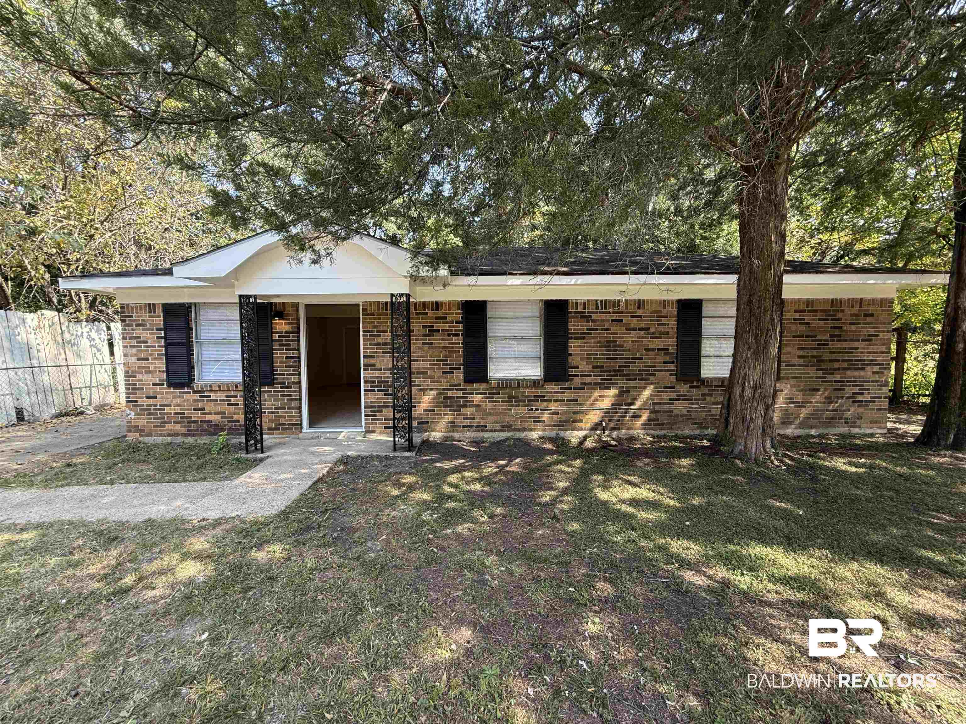 320 E Street Prichard, AL 36610 - Photo 1 of 16 Ranch-style home with a front yard