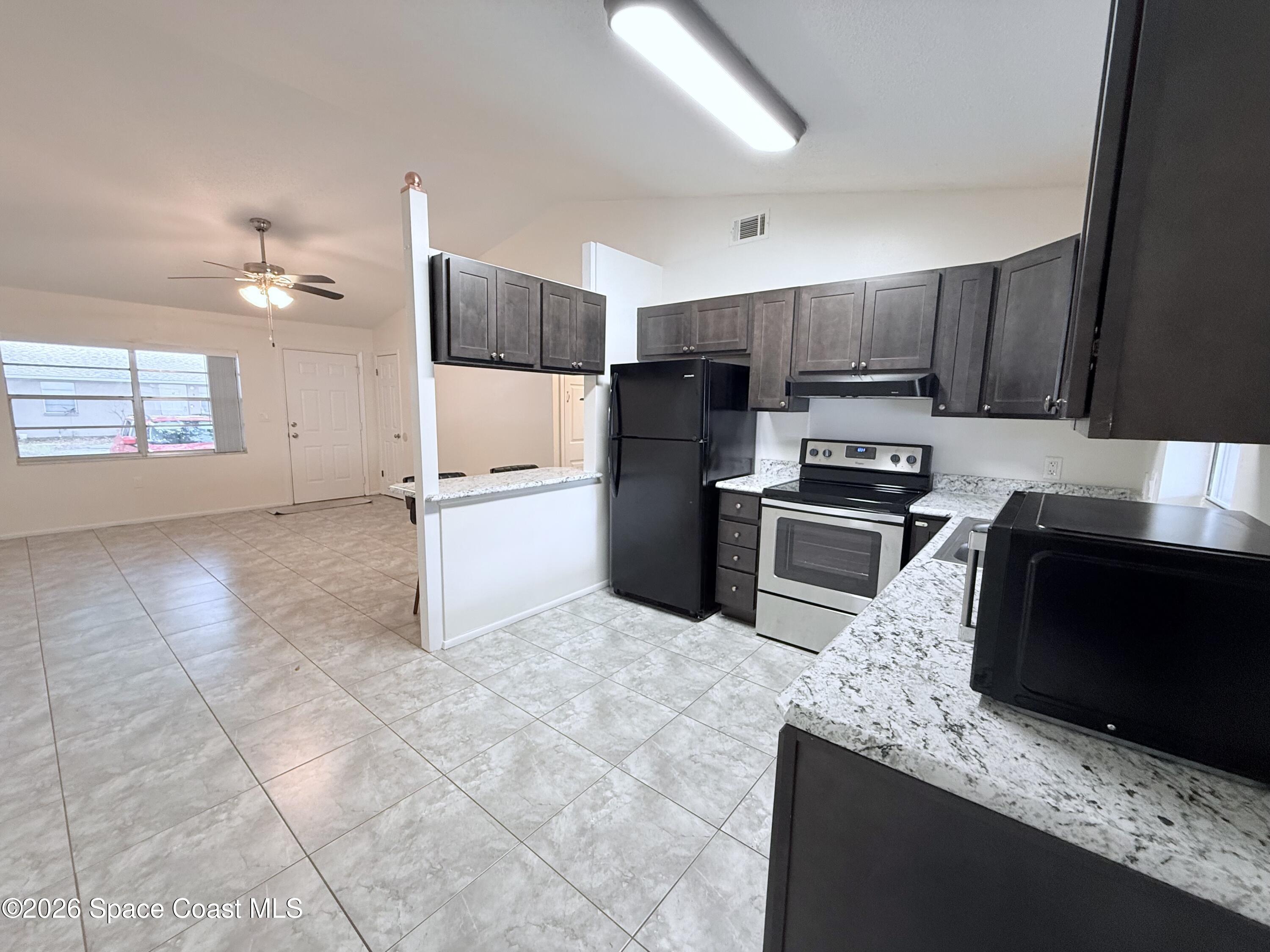 3225 Murrell Road, Unit 4 Rockledge, FL 32955 - Photo 7 of 22 IMG_4530