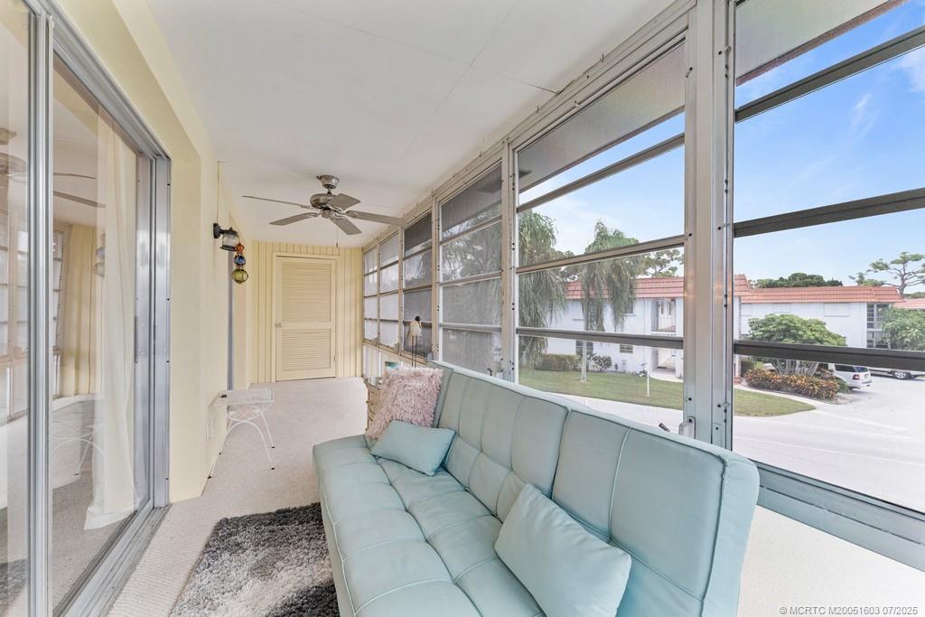 2600 Southeast Ocean Boulevard, Unit FF14 Stuart, FL 34996 - Photo 19 of 26 a living room with furniture and a large window